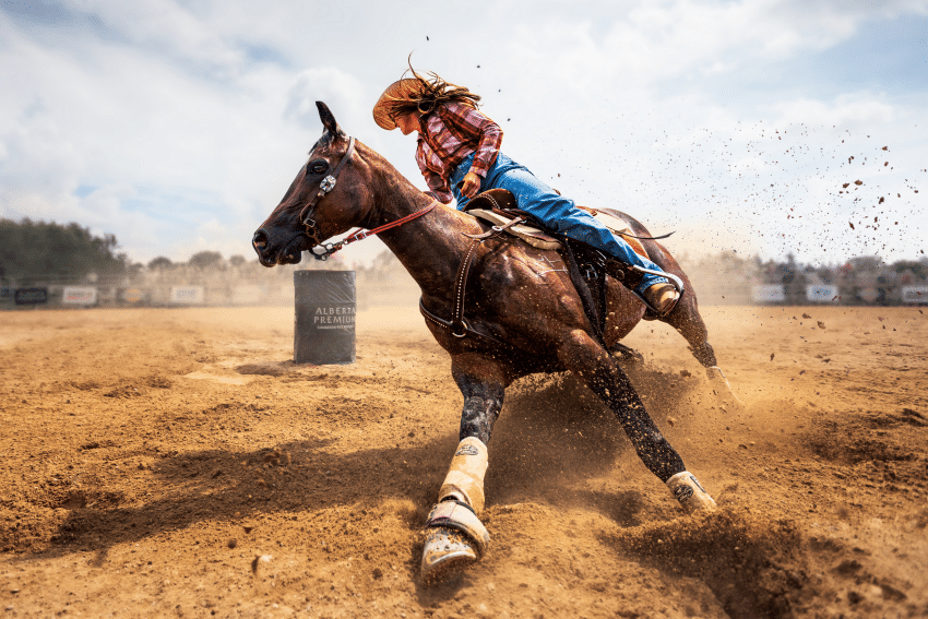 Cowgirl at a barrel racing competition